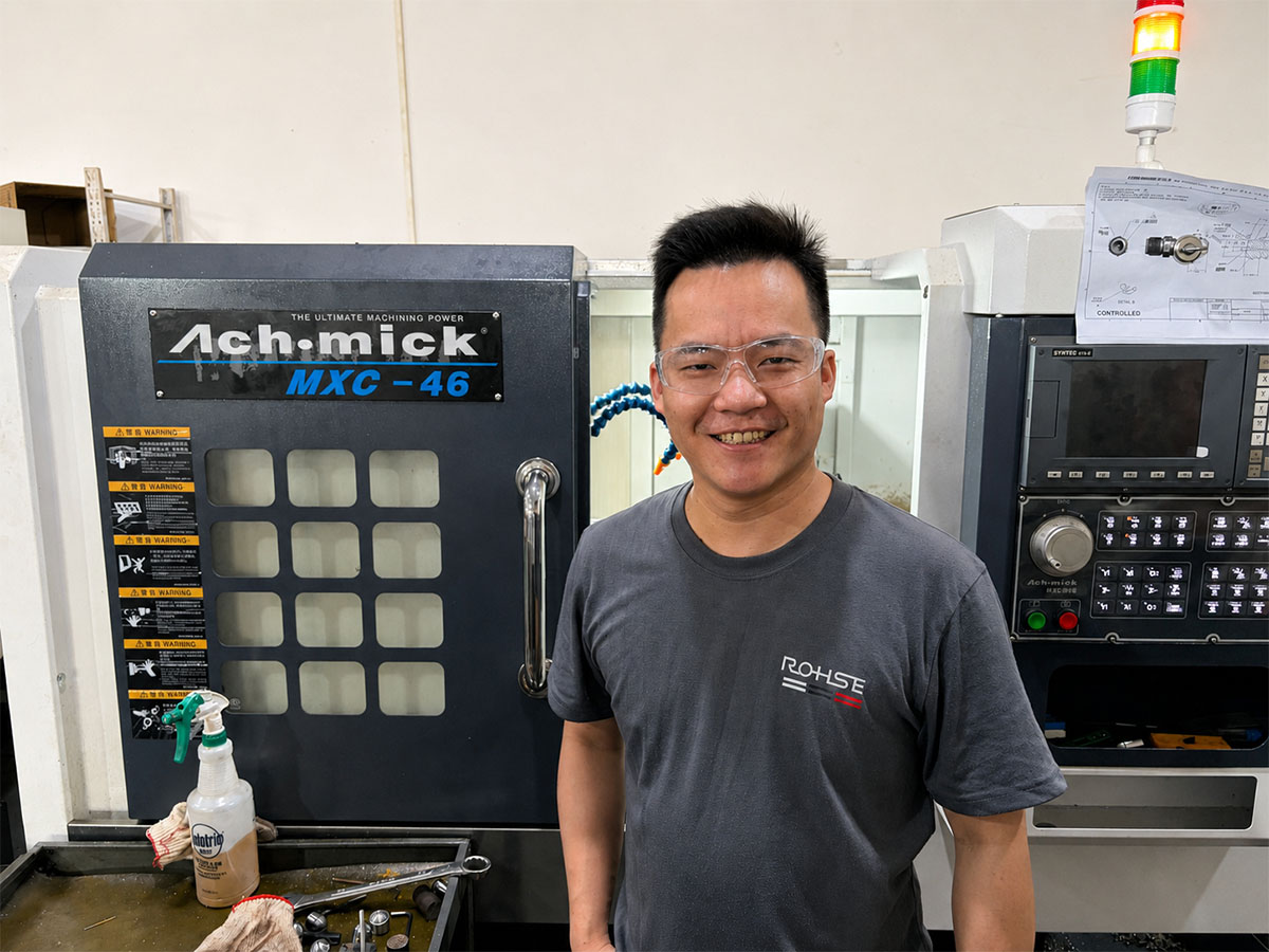 CNC workshop operator and machine