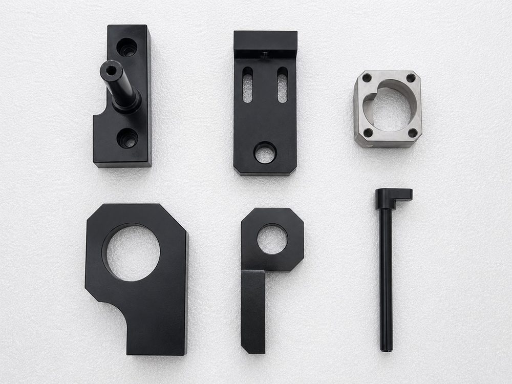 Automation brackets, mounting plates, and fixtures