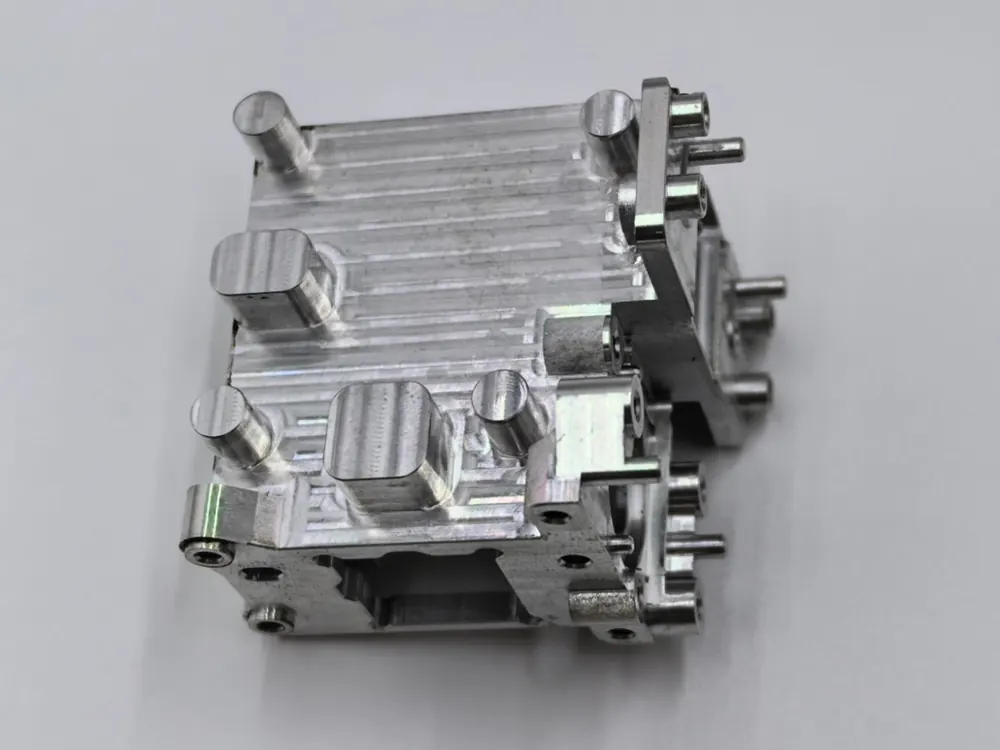 CNC machined 6061 aluminum part with features on several faces