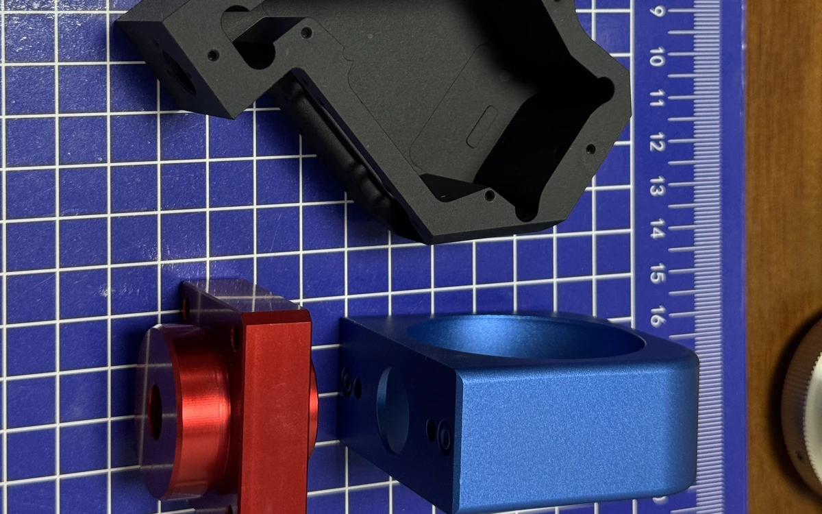 Anodized aluminum parts showing surface finishing results
