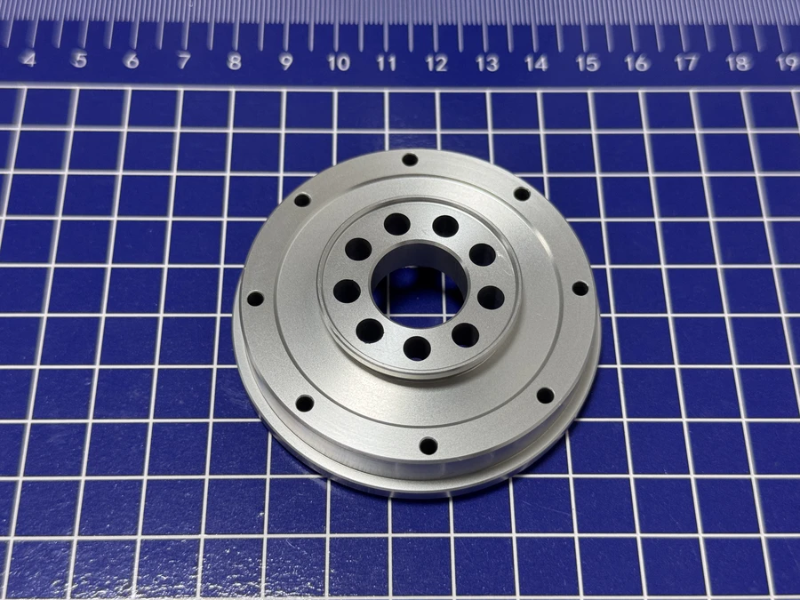 Machined aluminum flange on a measurement mat
