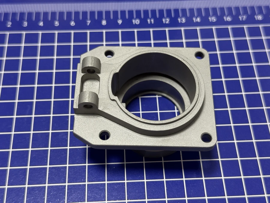 Machined carbon or alloy steel housing on a measurement mat
