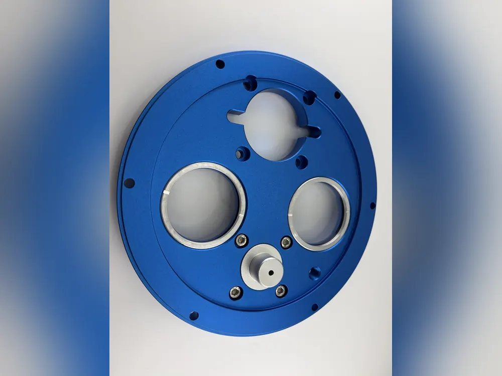 Blue anodized 6061 aluminum plate assembly with fitted inserts