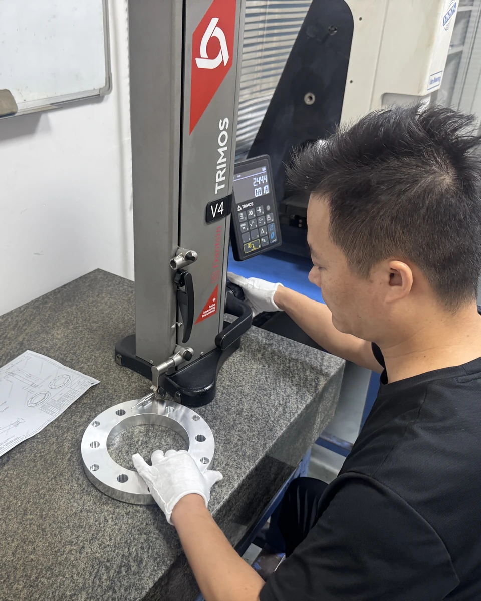 Dimensional inspection with height gauge at Meili Machining