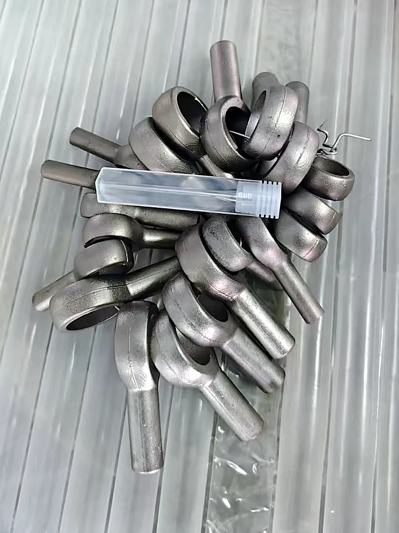 Batch of investment-cast duplex stainless steel blanks before machining